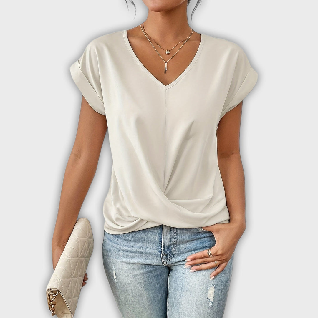 טופ עם צווארון וי ודפי כפתורים